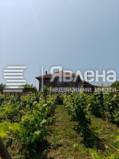 къща