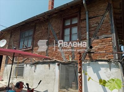 къща
