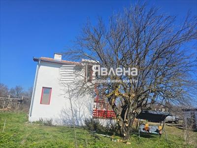 къща